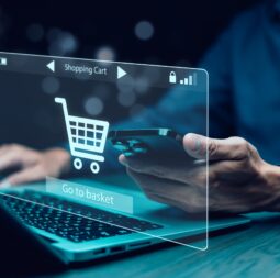 Businessman,Hold,Smartphone,With,Online,Shopping,Concept,,Marketplace,Website,With